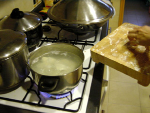 The raw dumplings are dipped into plain boiling water to rinse off the excess flour and 'seal' the parcel to stop the contents from seeping out.