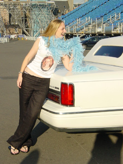 Lounging on the back of the limo.